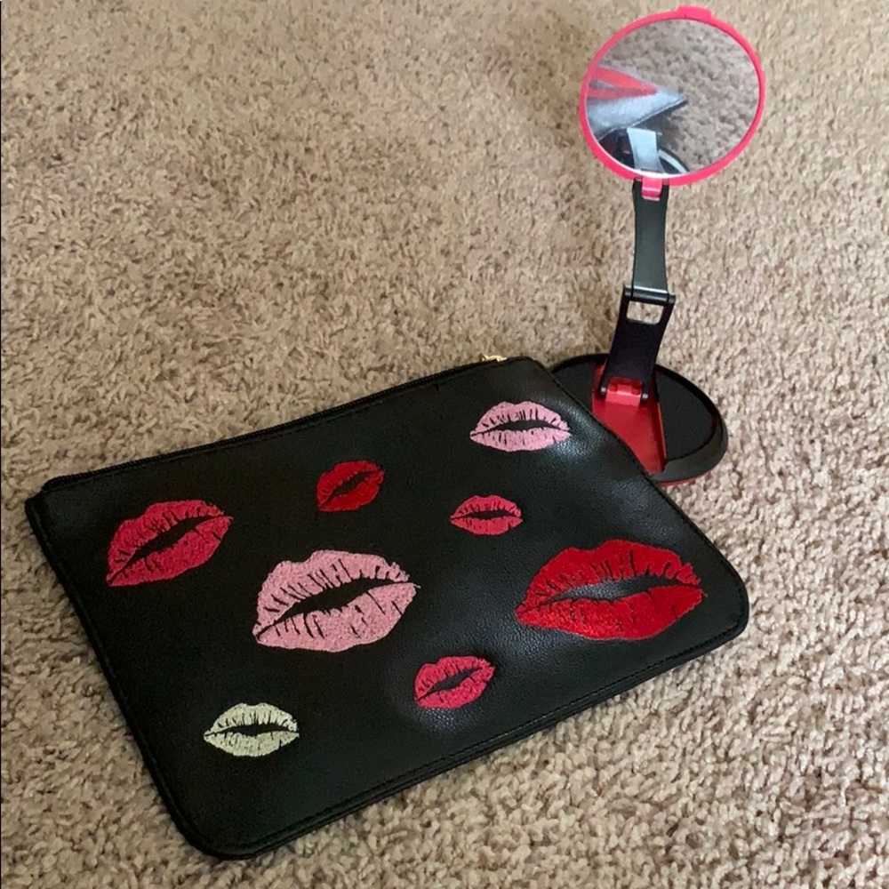 Cosmetic bag and mirror